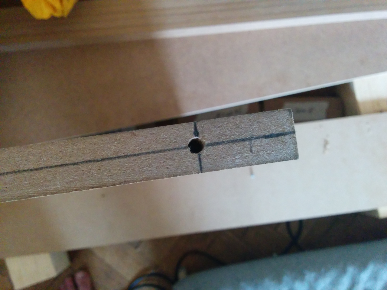 One of the connections – you drop in a steel pin and the piece above has a corresponding hole, thus holding both pieces together when they're placed.